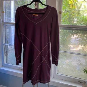 Purple fitted elastic dress.